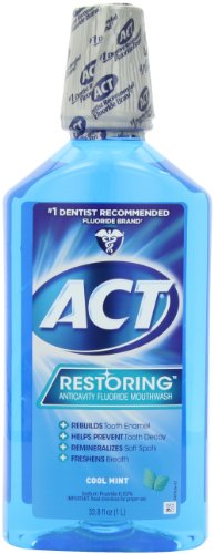 Book Cover ACT Restoring Anticavity Flouride Mouthwash Cool Splash Mint 33.8 fl.oz