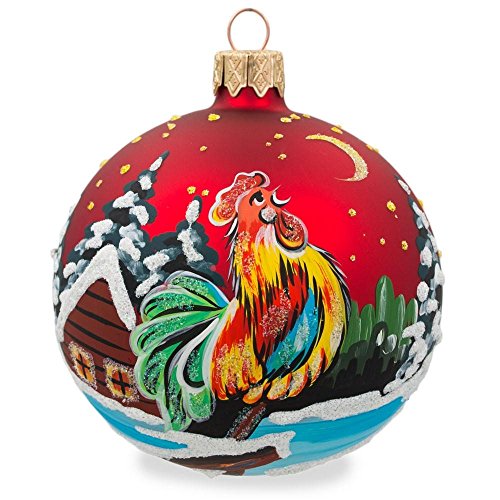 Book Cover Rooster in Winter Village on Red Glass Ball Christmas Ornament 3.25 Inches