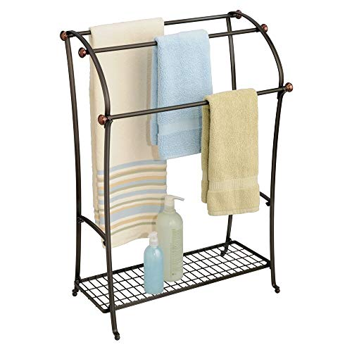 Book Cover mDesign Large Freestanding Towel Rack Holder with Storage Shelf - 3 Tier Metal Organizer for Bath & Hand Towels, Washcloths, Bathroom Accessories - Bronze/Warm Brown