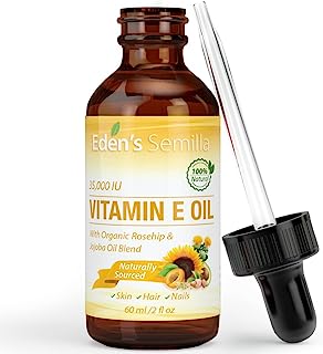 Book Cover 100% Natural Vitamin E Oil 35,000 IU + Organic Rosehip & Jojoba Blend - 2 OZ Bottle. FAST Absorbing Skin Protection For Face & Body. Pure Ingredients - Ideal For Sensitive Skin - Use Daily