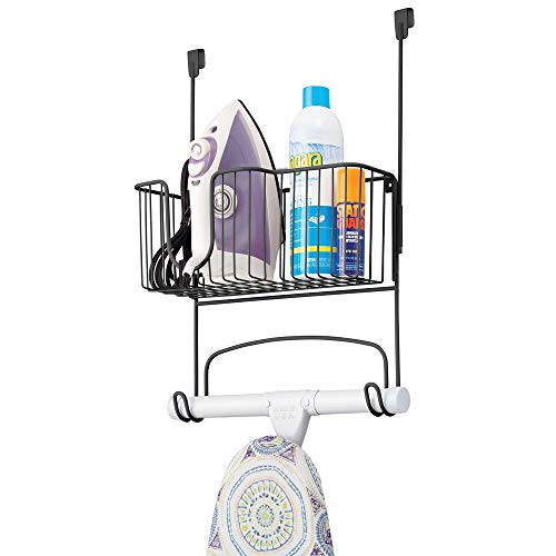Book Cover mDesign Metal Over Door Ironing Board Holder with Large Storage Basket - Holds Iron, Board, Spray Bottles, Starch, Fabric Refresher - for Laundry, Utility Room, Garage - Matte Black