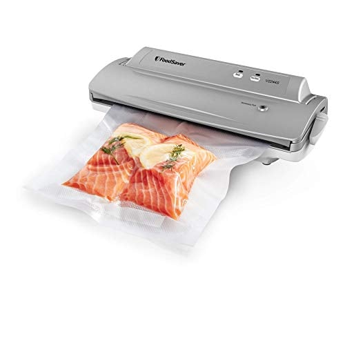 Book Cover FoodSaver V2244 Vacuum Sealer Machine for Food Preservation with Bags and Rolls Starter Kit #1 Vacuum Sealer System Compact & Easy Clean UL Safety Certified Silver