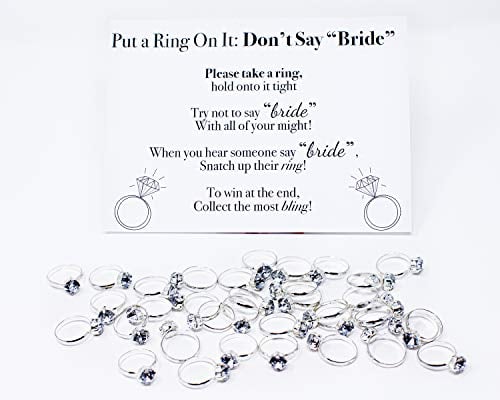 Book Cover Put a Ring On It Bridal Shower Game with rings - Bridal shower ring game with Don't Say Bride Game Rules and 36 Plastic Diamond Rings for guests