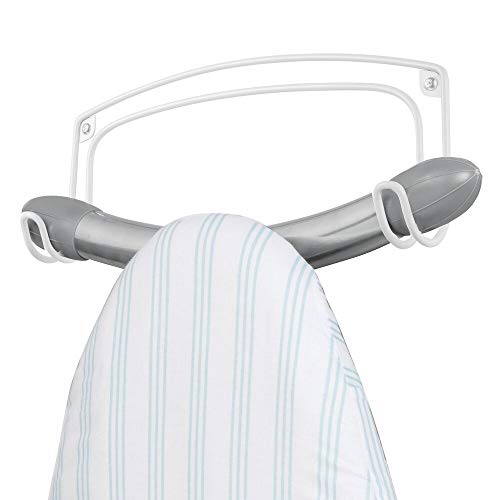Book Cover mDesign Metal Wire Wall Mount Ironing Board Holder - 2 Strong Hooks Hold Ironing Board, Towels, Cleaning Brushes, Spray Bottles, Coats - for Laundry Rooms, Utility Rooms, Closets, Garages - White